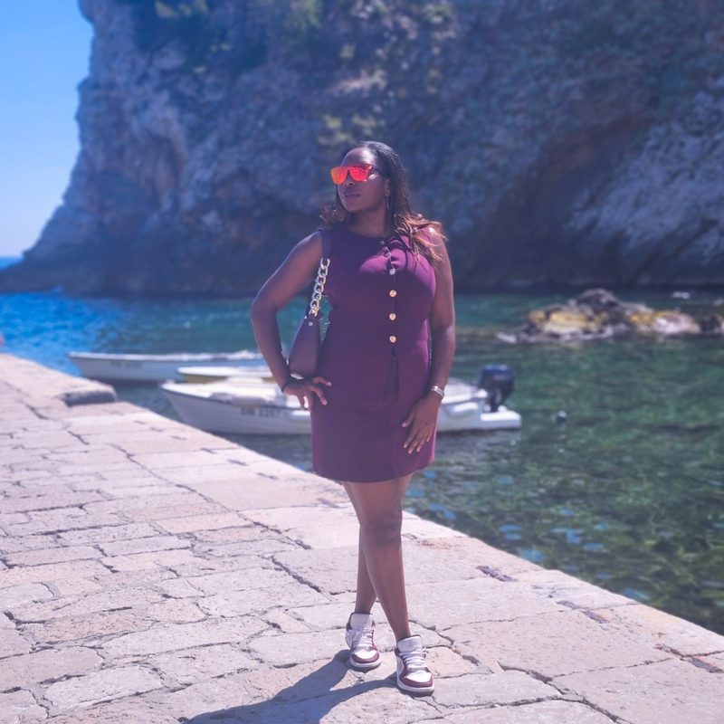 Hayley Molefe on a cliffside path in Dubrovnik