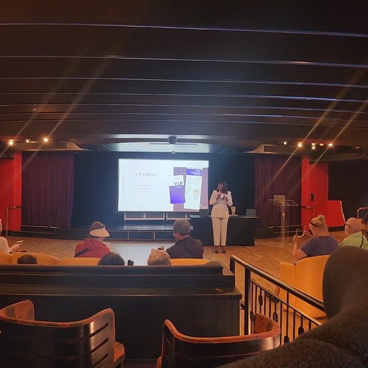 Audience watching an onboard destination seminar