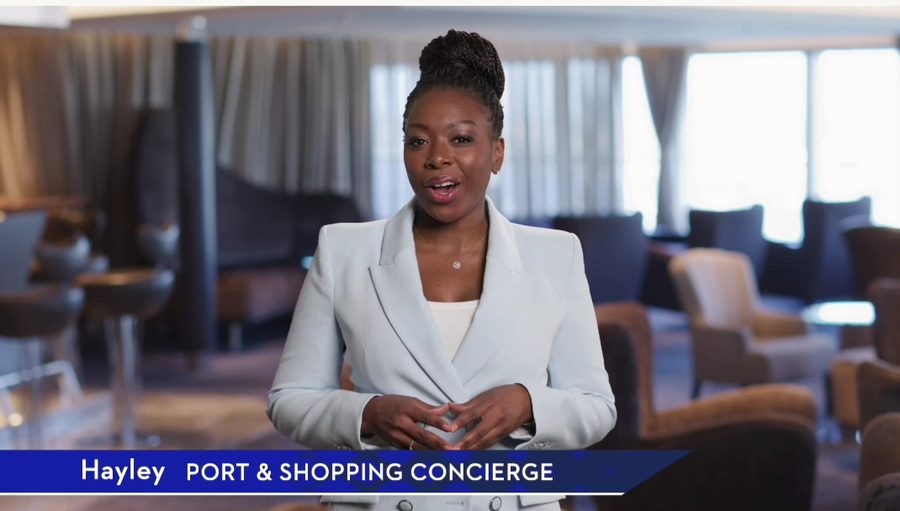 Hayley Molefe presenting onboard as port and shopping concierge